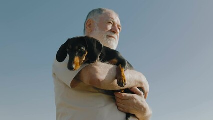 Field of Love Elderly Gentleman and Dachshund Cherish Sunset Together