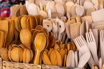 basket full of wooden spoons and forks