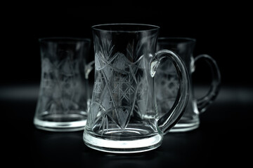 empty crystal beer mug  on black background close up