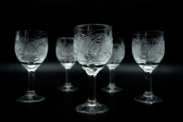 wine glasses on black background close up