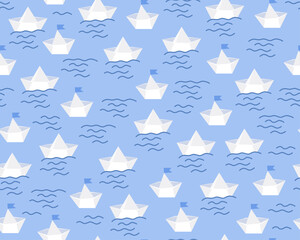 Sea seamless pattern. Summer childish pattern. Paper boats on the waves. White boats on a blue background.  Sea with waves. Cute cartoon design. Design for fabric, paper, print, wrapping.