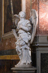 Sculpture of angel by workshop of Bernin in Santa Francesca Romana. Roman Forum. Rome, Italy