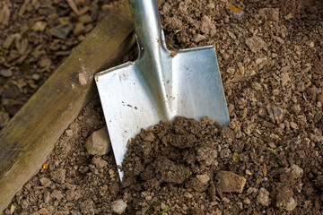 High angle view of spade gardening tool at vegetable bed of home garden at Swiss City of Zürich on...