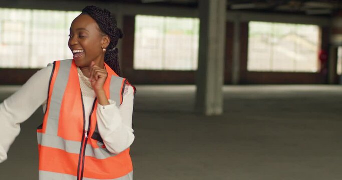 Confident Black Woman Dancing Happily at Urban Construction Site