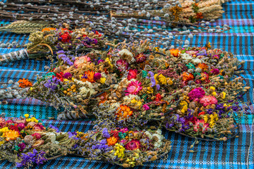 Many colorful flowers lie on the table