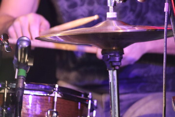 close up of drummer in action