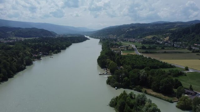 smooth drone shot of the river. Drava river in Slovenia