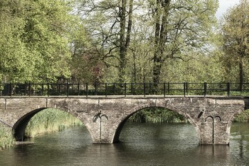 Fototapeta premium old stone bridge over the canal