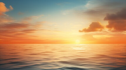 Naklejka na ściany i meble A beautiful sunset over a calm sea.