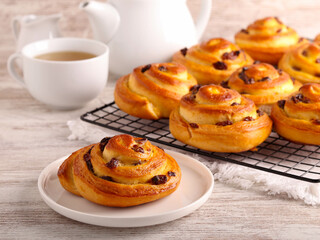 Custard cream and raisin buns