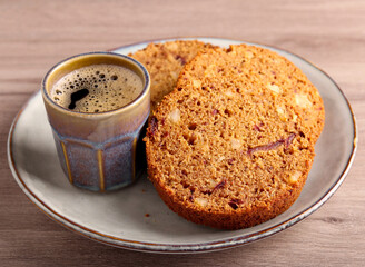 Slices of date and nut roll, with coffee
