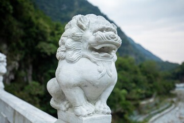 Fototapeta na wymiar Taiwan, Hualien, Taroko, Sand Card Walk, Bridge Pier, Stone Carving Lion,