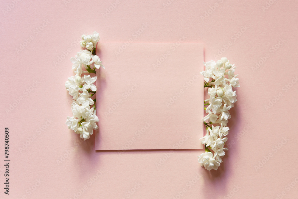 Poster Mother's day card with pink blank and white flower on pink background