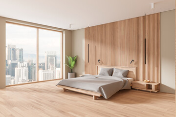 Stylish home bedroom interior with bed and nightstand, panoramic window
