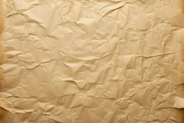 Crumpled brown craft paper texture, ideal for vintage or rustic themes