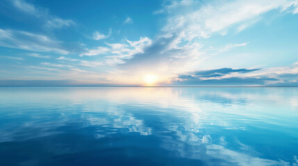 Obraz premium A serene sunrise with radiant sun rays breaking through the clouds over a calm sea, reflecting in the water
