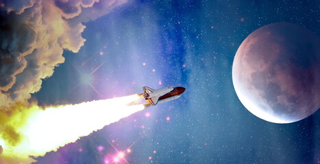 rockets launch into space on the starry sky. spacecraft flies into space with clouds of smoke....