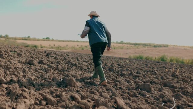 Autumn on the Farm Senior Agriculturalist Walking and Soil Testin