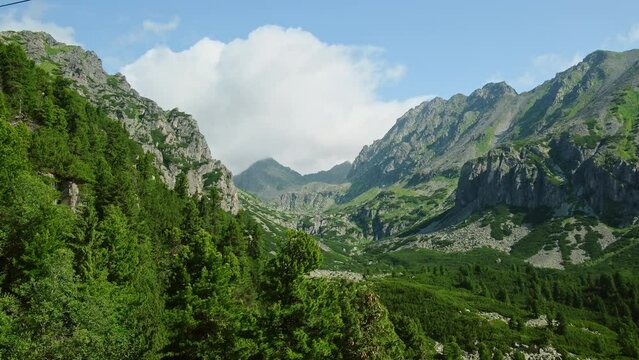 Cable car ride in High Tatras National Park near Strbske Pleso lake, Slovakia