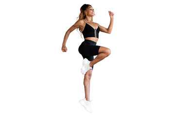 Athletic slender woman in fitness clothes jumps, cut out
