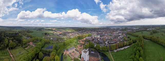 Wide aerial panorama of Huis Berg castle manor in Dutch province of Gelderland seen from above....