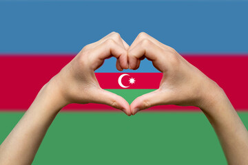 Azerbaijan flag with two hands heart shape, express love or affection concept, hand heart love 