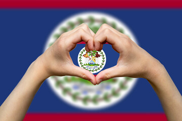 Belize flag with two hands heart shape, vector design, express love or affection concept, support 