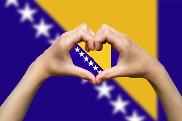 Bosnia flag with two hands heart shape, support or donate to Bosnia, vector design, express love 