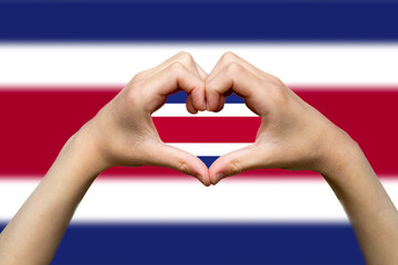 Costa Rica flag with two hands heart shape, vector design, support or donate to Costa Rica