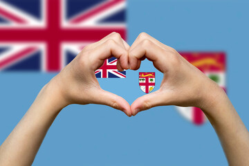 Fiji flag with two hands heart shape, vector design, patriotism and nationalism idea, support or 