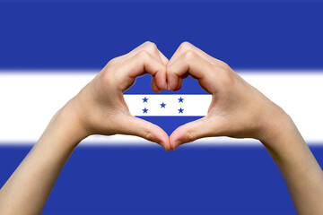 Honduras flag with two hands heart shape, express love or affection concept, support or donate 