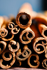 Close-up pile of cinnamon sticks.