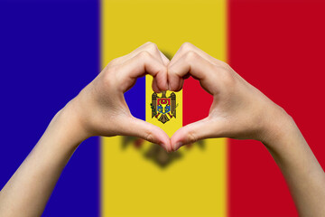 Moldova flag with two hands heart shape, patriotism and nationalism idea, vector design, support 