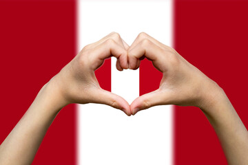 Obraz premium Peru flag with two hands heart shape, express love or affection concept, support or donate to Peru