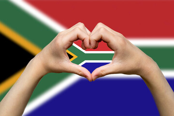 South Africa flag with two hands heart shape, support or donate to South Africa, patriotism and 