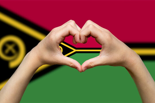 Vanuatu flag with two hands heart shape, express love or affection concept, patriotism and 