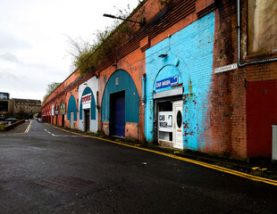 Stores built into an old railway bridge