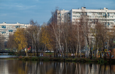 Multi-storey residential complex on the river bank in a residential area