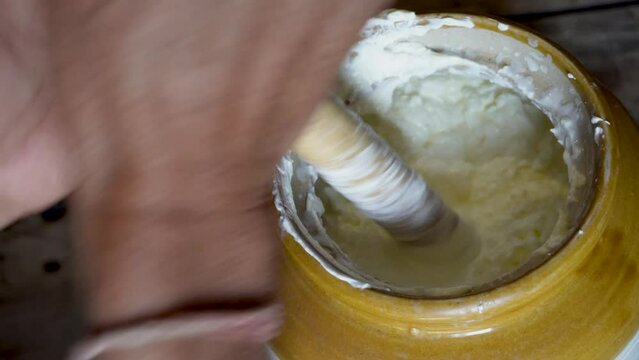 Discover Uttarakhand's Bilona method: curd churned through bilona to extract butter, heated to purify into ghee. Authentic Indian tradition