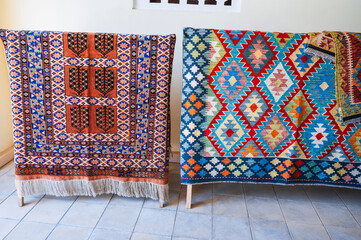 Colorful expensive vintage oriental Arabic carpets on the market in Uzbekistan