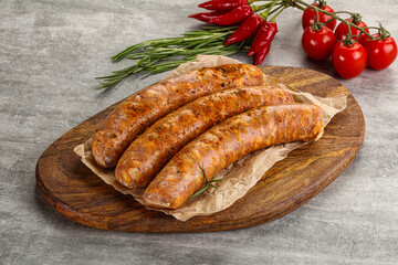 Raw sausages with spices and herbs