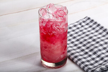 Cold strawberry cocktail with ice