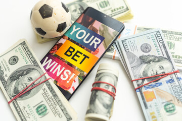 tablet pc with app for sport bets, on top of stacks of banknotes, white background, concept of online bets 3d render