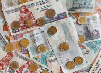 background of banknotes - Egyptian currency - Egyptian pounds - coins