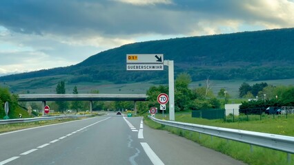 Approaching Gueberschwihr: Verdant Vistas along D83 in Haut-Rhin, Alsace, France