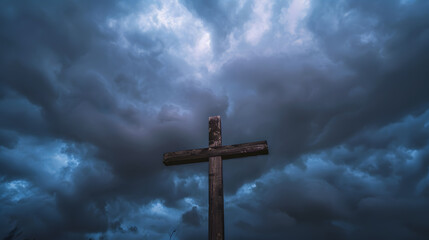 A wooden Christian cross seen from a field