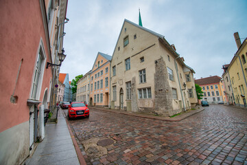 Tallinn, Estonia - July 2, 2017: Streets and buildings of Tallinn on a cloudy summer day