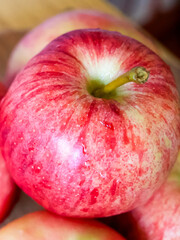 Fresh Red Apple. A vivid red apple with water droplets, symbolizing freshness. Ideal for health and nutrition themes.