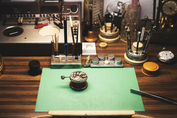 Watchmaker's workbench with all specialised tools for watch repair.
