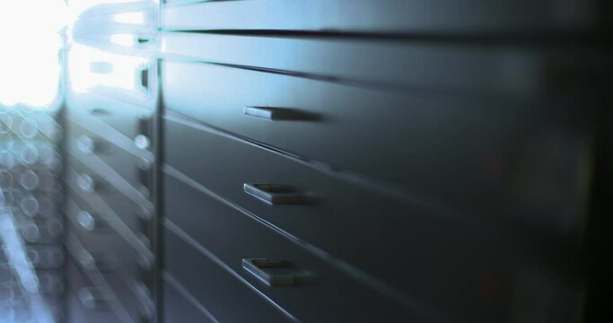camera pan of metal cabinets in archive